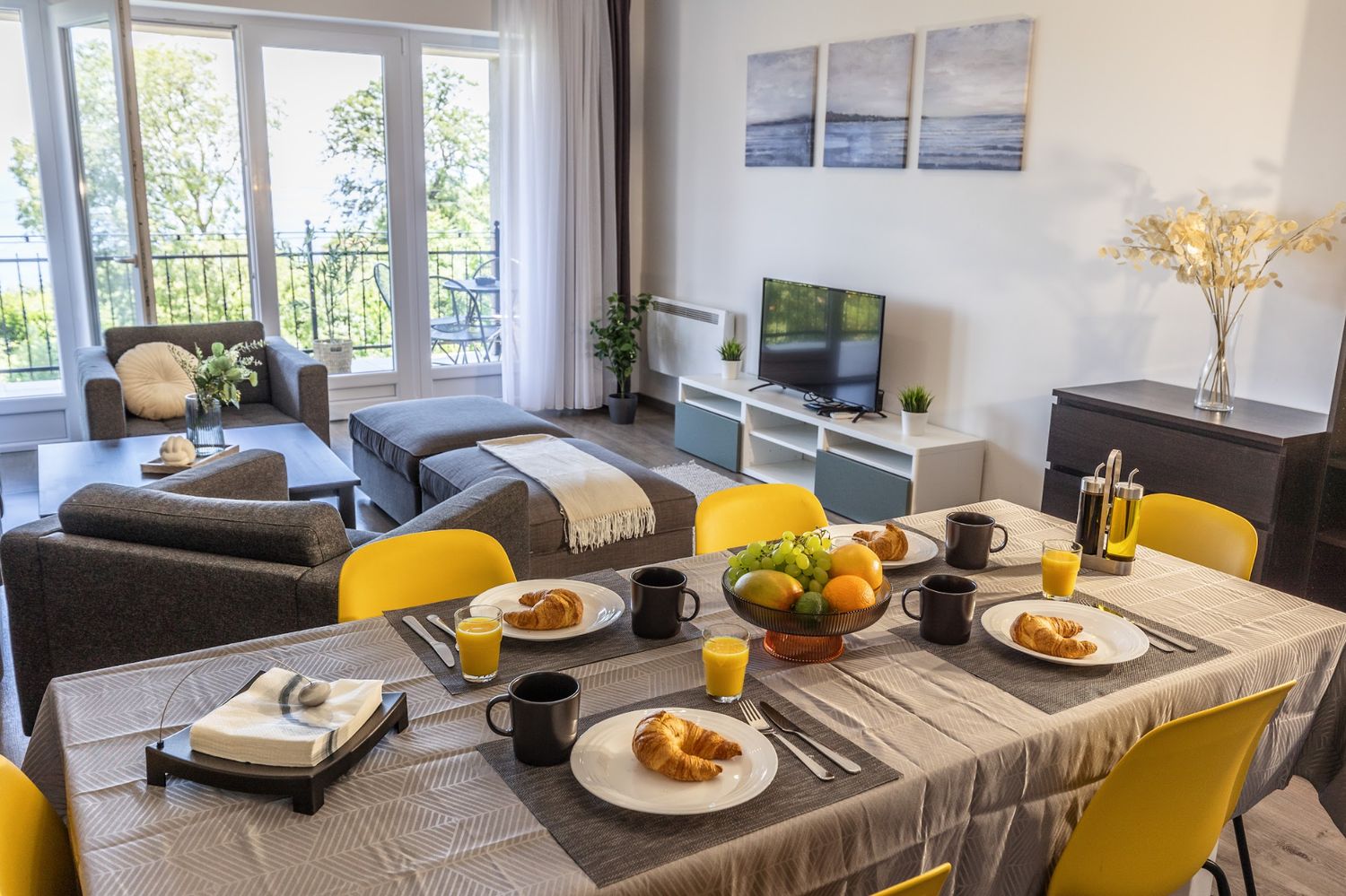 Apartment 4 dining table set for breakfast