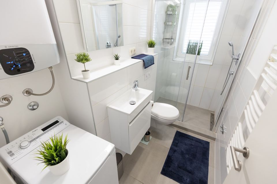 Guest bathroom with washing machine
